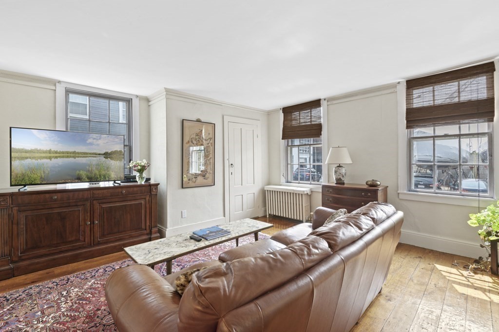 80 Front Street Marblehead, MA 01945 - Photo 20 of 42 a living room with furniture and a dresser