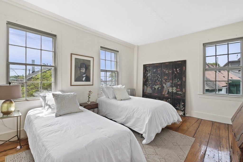 80 Front Street Marblehead, MA 01945 - Photo 23 of 42 a bedroom with two beds and a large window
