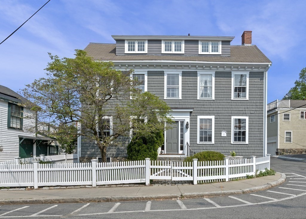 80 Front Street Marblehead, MA 01945 - Photo 3 of 42 a view of a brick building next to a road