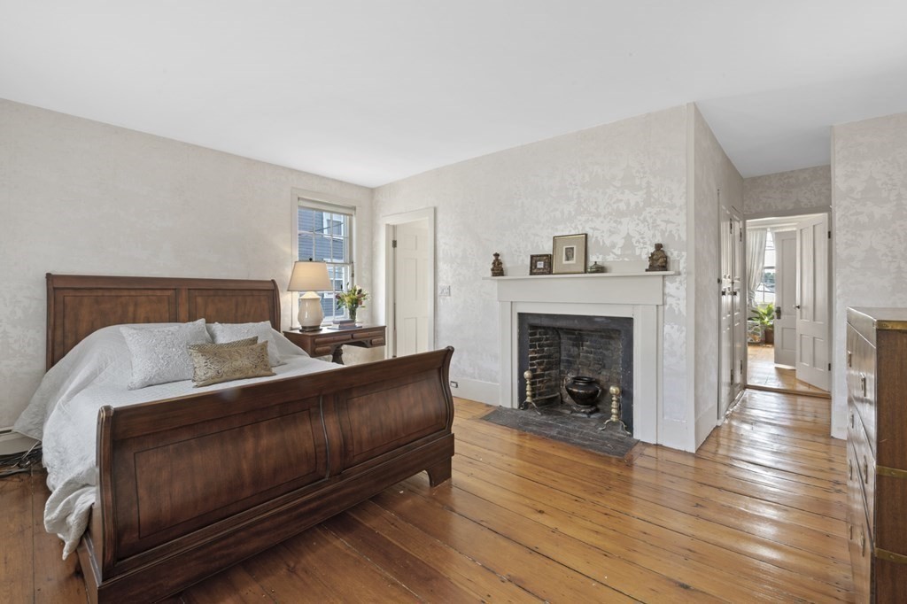 80 Front Street Marblehead, MA 01945 - Photo 31 of 42 a living room with furniture and a fireplace