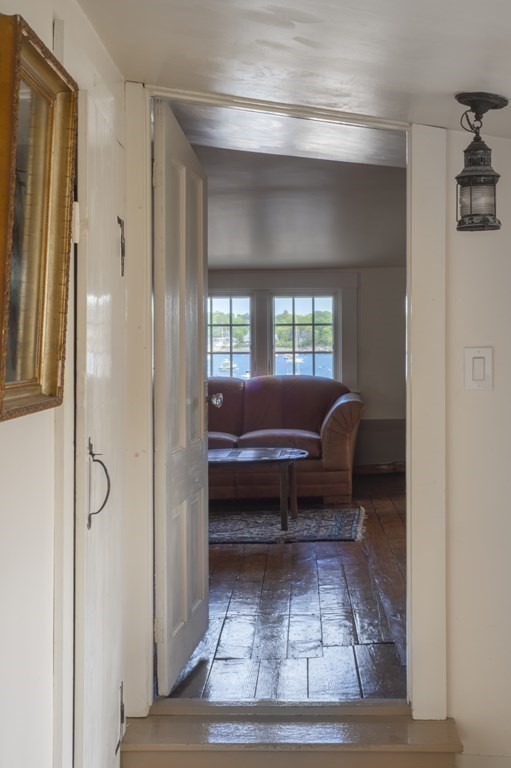 80 Front Street Marblehead, MA 01945 - Photo 32 of 42 a living room with a couch and a table