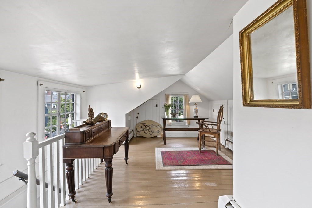 80 Front Street Marblehead, MA 01945 - Photo 33 of 42 a view of entryway livingroom and hall with wooden floor
