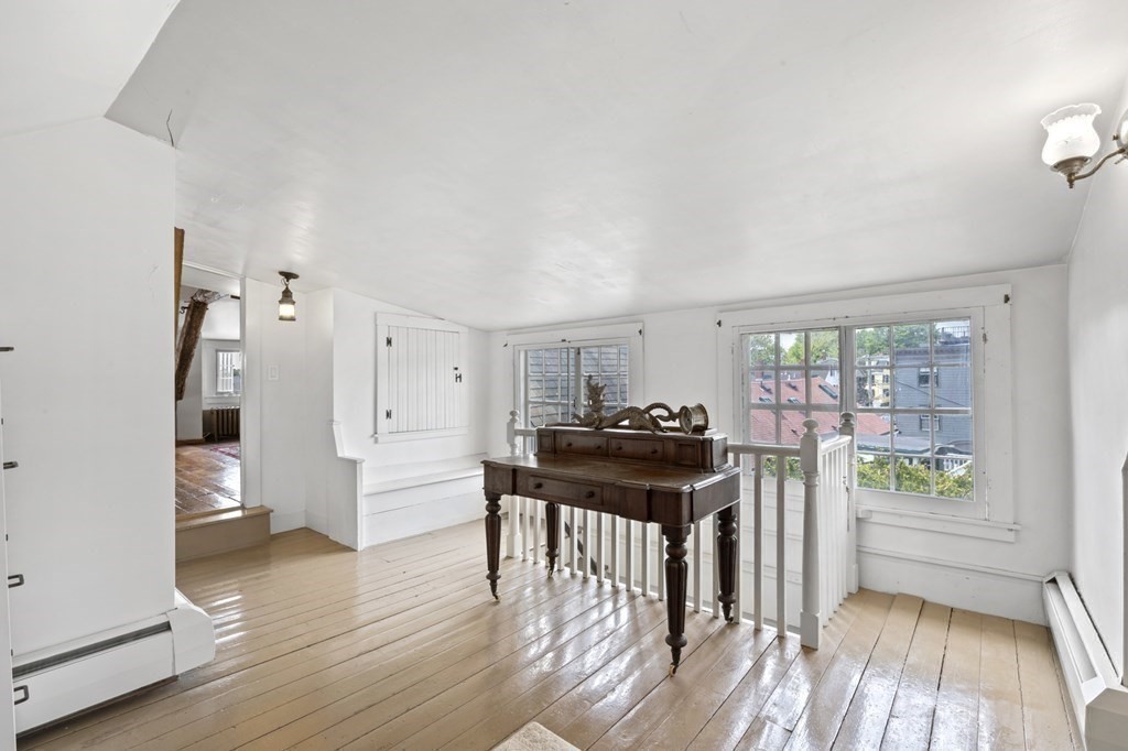 80 Front Street Marblehead, MA 01945 - Photo 34 of 42 a view of a dining room with furniture and wooden floor