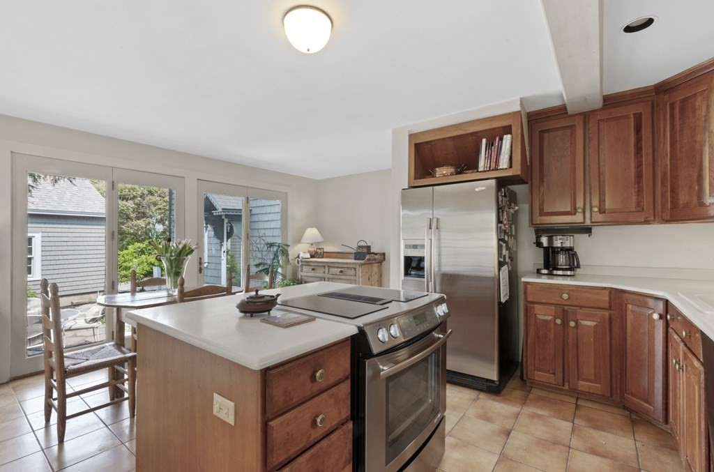 80 Front Street Marblehead, MA 01945 - Photo 10 of 42 a kitchen with a stove a sink and a microwave