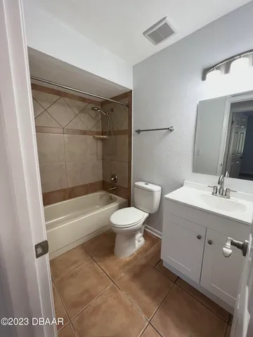 a view of a room with a window