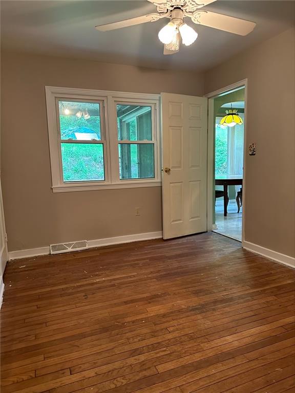 33 Union Avenue Pittsburgh, PA 15205 - Photo 12 of 32 an empty room with wooden floor and windows