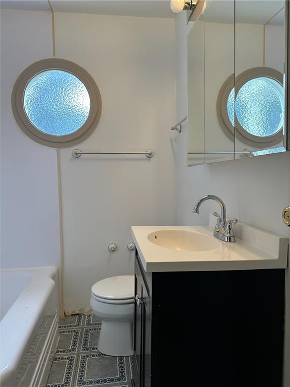 33 Union Avenue Pittsburgh, PA 15205 - Photo 18 of 32 a bathroom with a toilet a sink and a mirror