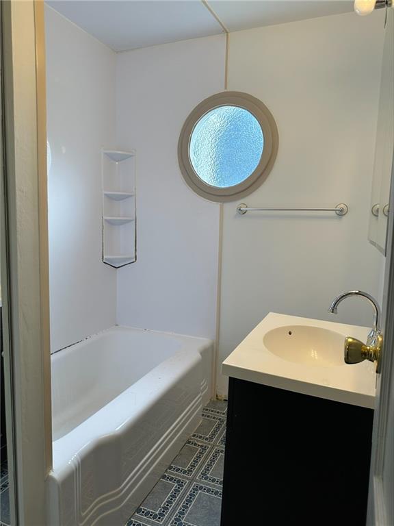 33 Union Avenue Pittsburgh, PA 15205 - Photo 20 of 32 a bathroom with a sink a bathtub and a shower