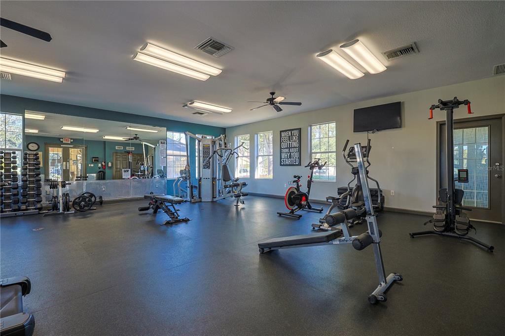 4116 Southwest 54th Circle Ocala, FL 34474 - Photo 28 of 36 a view of a room with gym equipment
