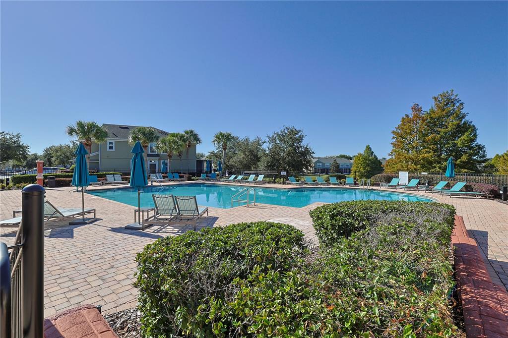 4116 Southwest 54th Circle Ocala, FL 34474 - Photo 32 of 36 a view of a swimming pool with a patio