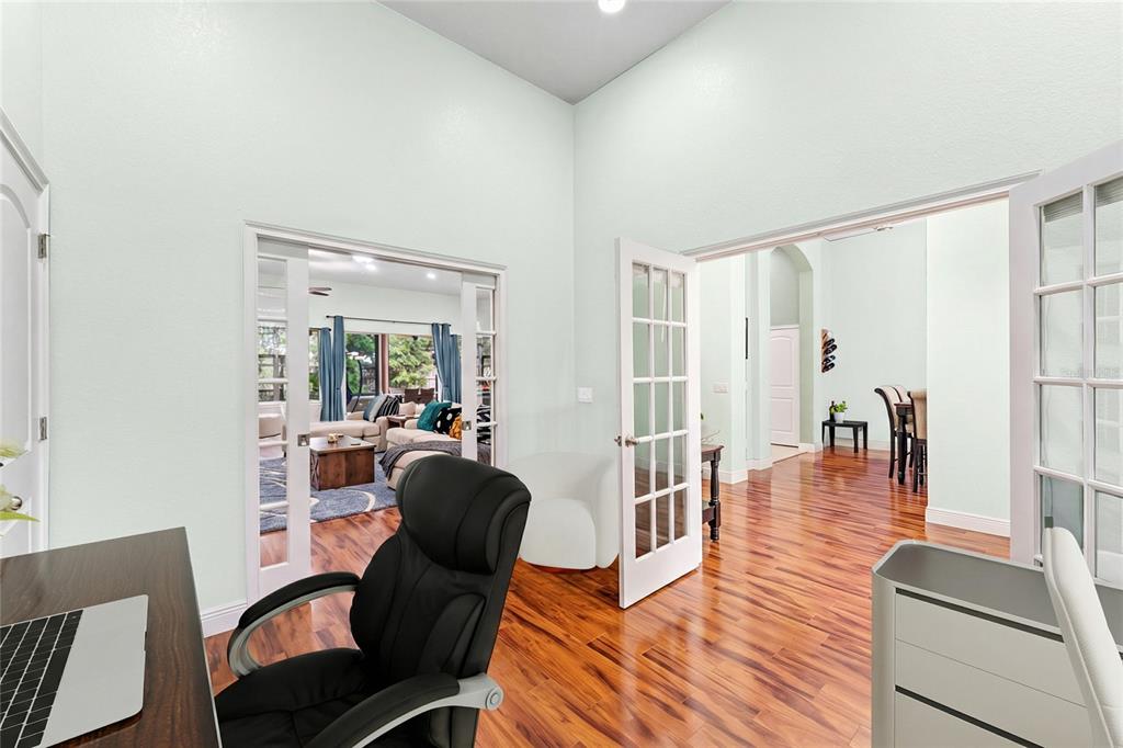 5130 Morning Dew Loop Oviedo, FL 32765 - Photo 14 of 38 a living room with furniture and a wooden floor
