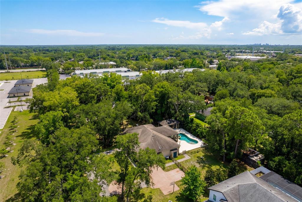 5130 Morning Dew Loop Oviedo, FL 32765 - Photo 37 of 38 an aerial view of a houses with a yard