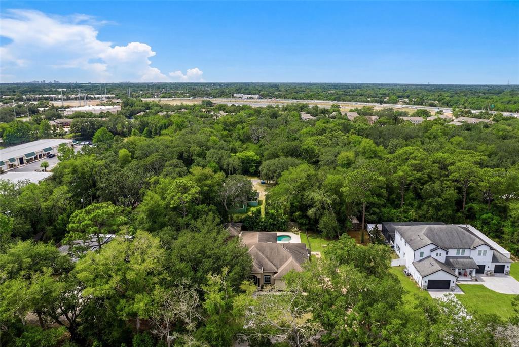 5130 Morning Dew Loop Oviedo, FL 32765 - Photo 38 of 38 an aerial view of a house with a yard