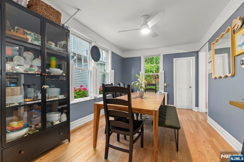 370 Undercliff Avenue Edgewater, NJ 07020 - Photo 18 of 35 a view of a dining room with furniture window and wooden floor