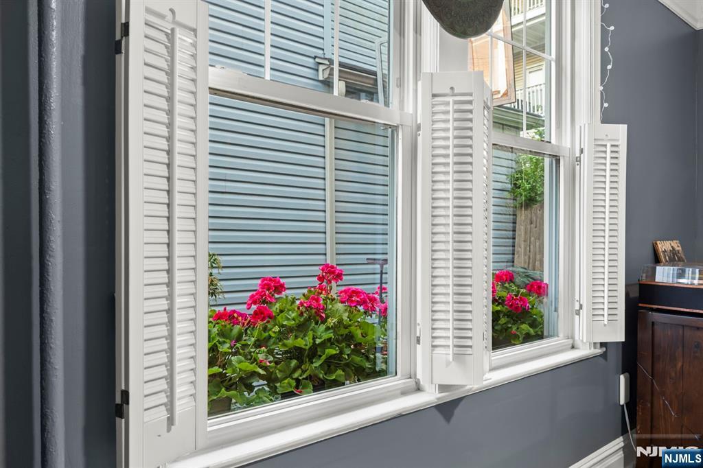 370 Undercliff Avenue Edgewater, NJ 07020 - Photo 19 of 35 a view of a house that has a flower plants
