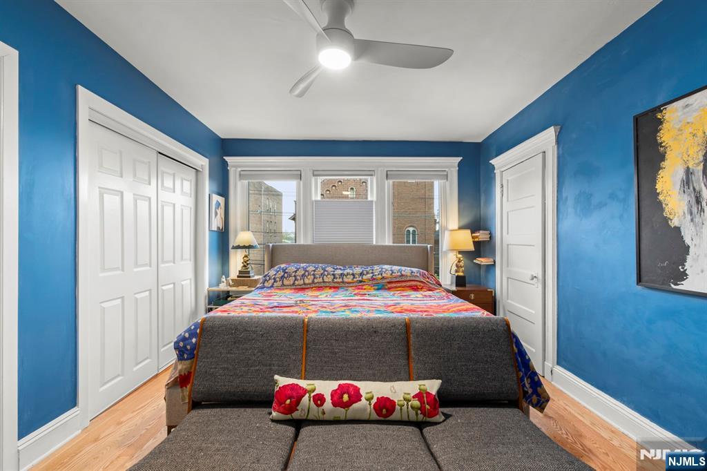370 Undercliff Avenue Edgewater, NJ 07020 - Photo 23 of 35 a bedroom with a bed and window