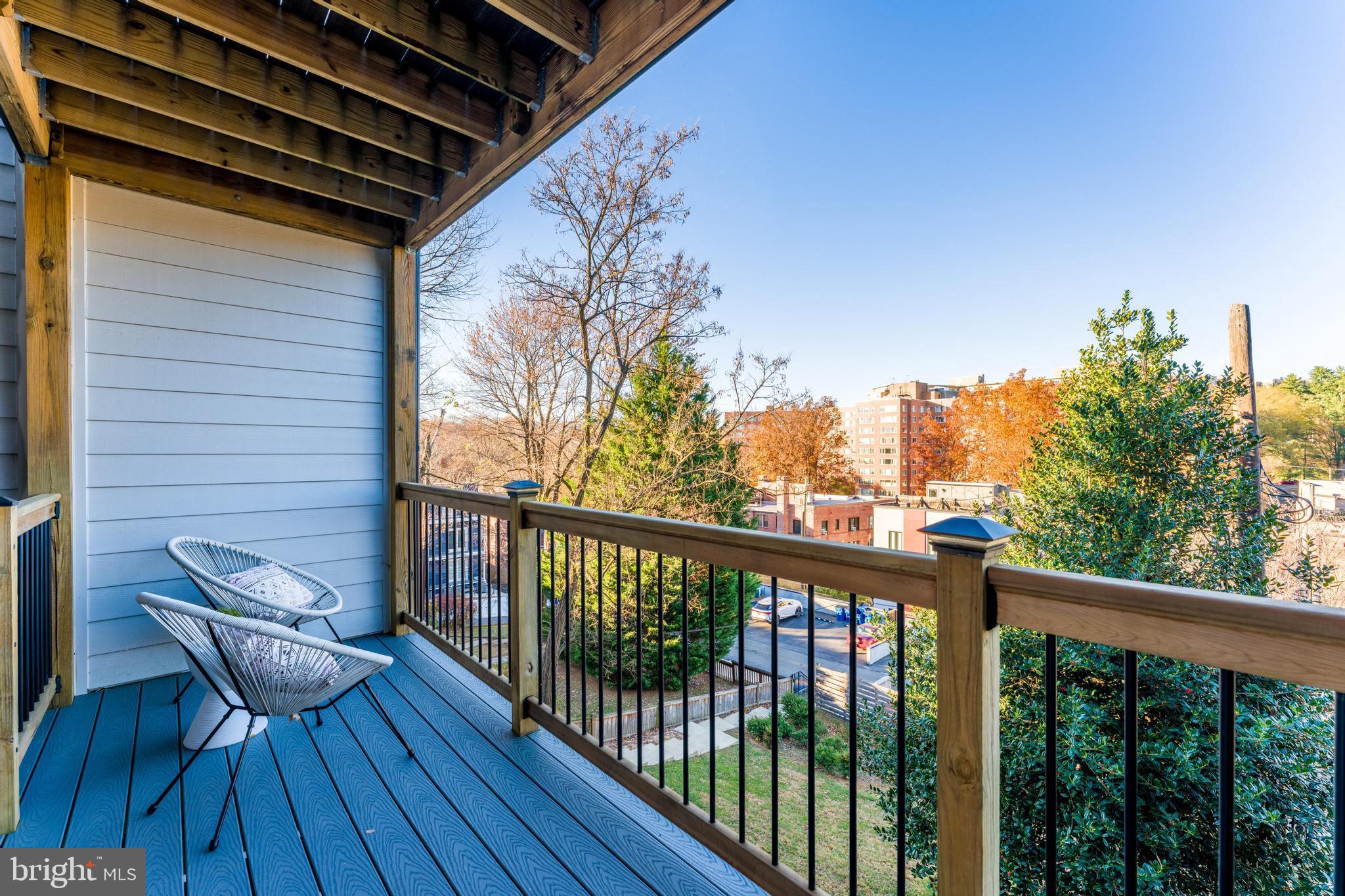 4017 Davis Place Northwest, Unit 6 Washington, DC 20007 - Photo 15 of 17 a view of balcony with wooden floor and seating space