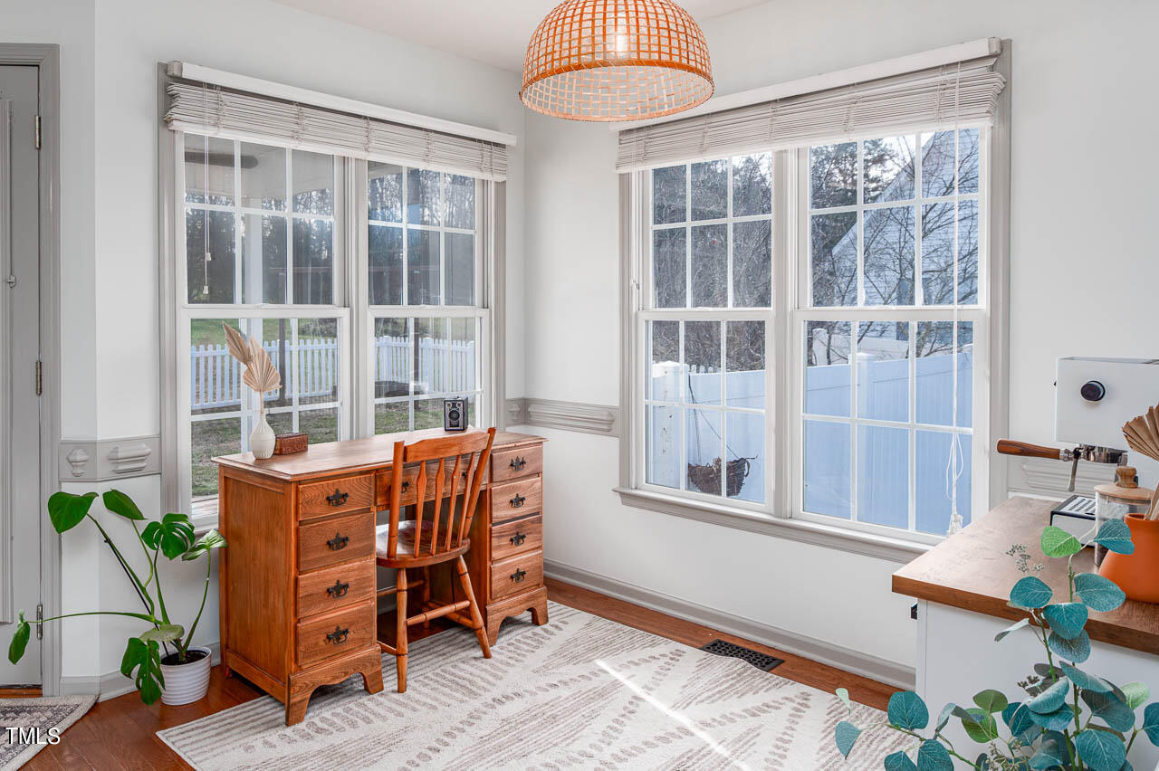 4552 Springbrook Drive Burlington, NC 27215 - Photo 16 of 57 a dining room with furniture and a window