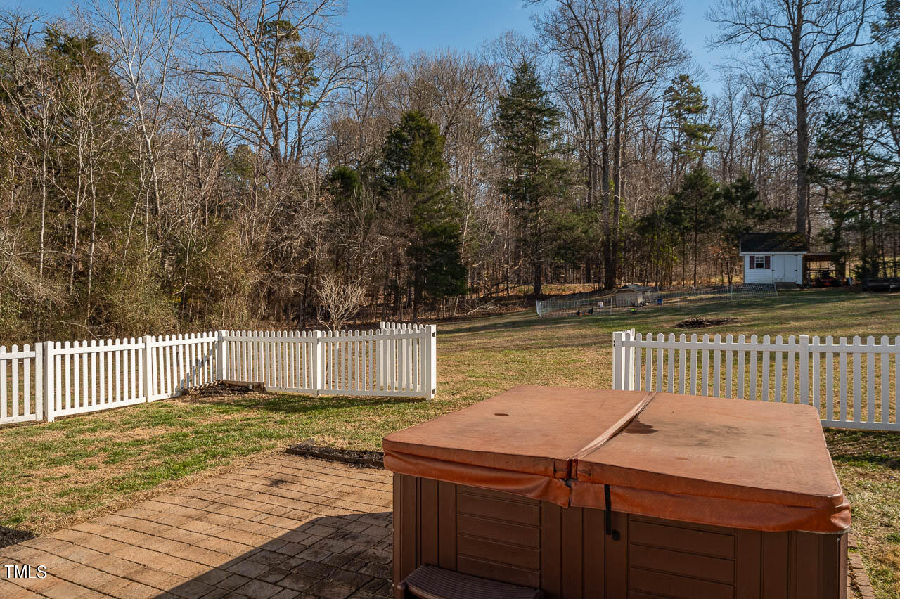 4552 Springbrook Drive Burlington, NC 27215 - Photo 35 of 57 a view of a backyard with wooden fence