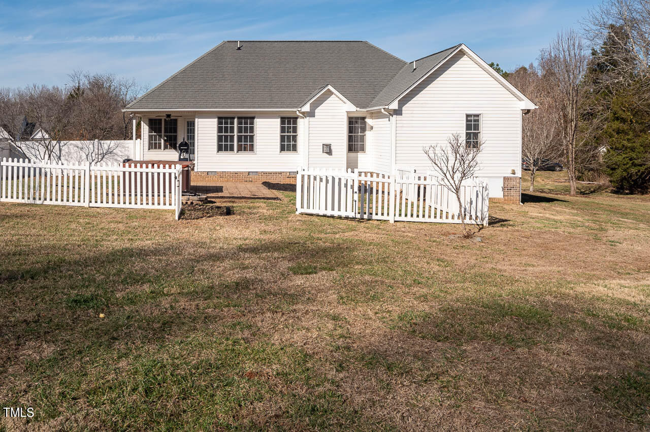 4552 Springbrook Drive Burlington, NC 27215 - Photo 40 of 57 a view of a house with a yard and fence