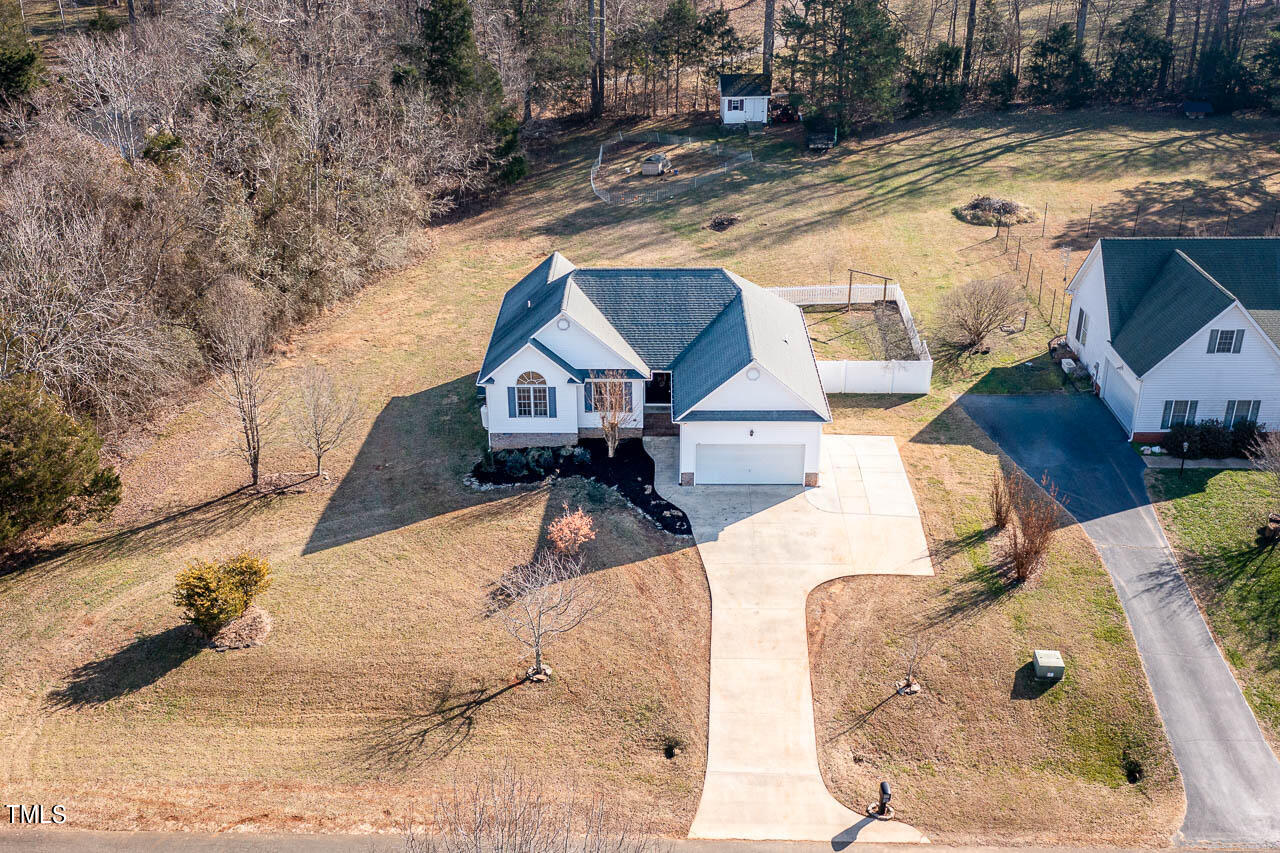 4552 Springbrook Drive Burlington, NC 27215 - Photo 4 of 57 swimming pool view with a backyard space