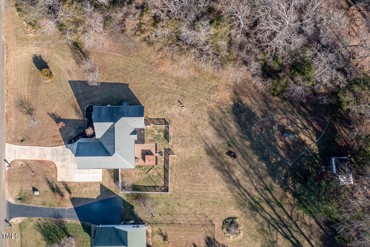 4552 Springbrook Drive Burlington, NC 27215 - Photo 45 of 57 an aerial view of houses with outdoor space