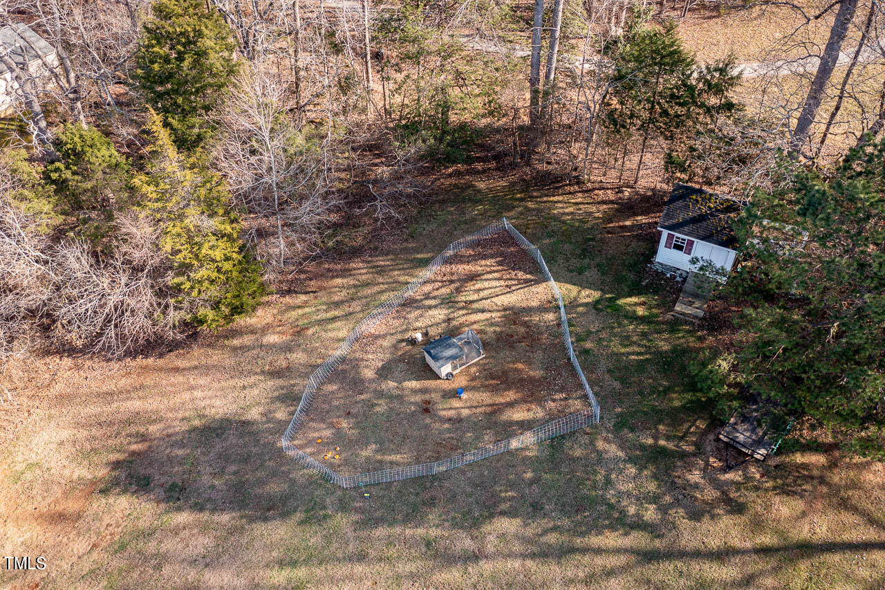 4552 Springbrook Drive Burlington, NC 27215 - Photo 50 of 57 a backyard of a house