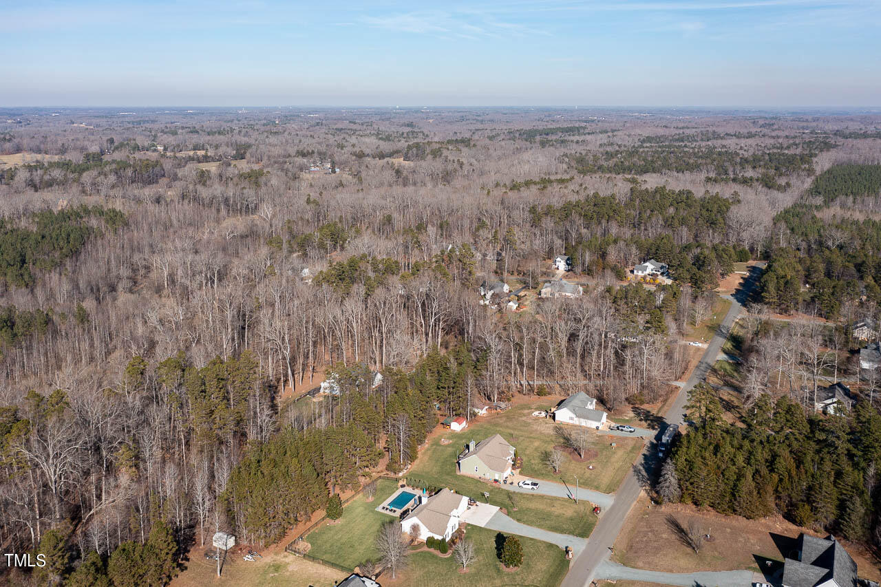 4552 Springbrook Drive Burlington, NC 27215 - Photo 53 of 57 an aerial view of a house with a yard