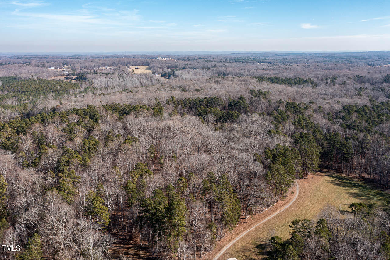 4552 Springbrook Drive Burlington, NC 27215 - Photo 55 of 57 an aerial view of a house with a yard
