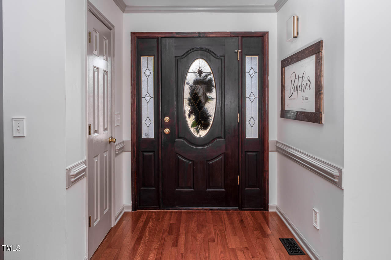 4552 Springbrook Drive Burlington, NC 27215 - Photo 8 of 57 a view of a entryway door with wooden floor