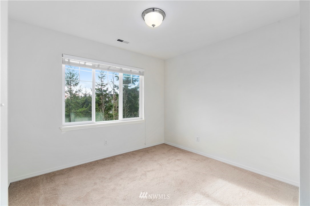 4024 Northeast 4th Place Renton, WA 98056 - Photo 24 of 29 an empty room with a window