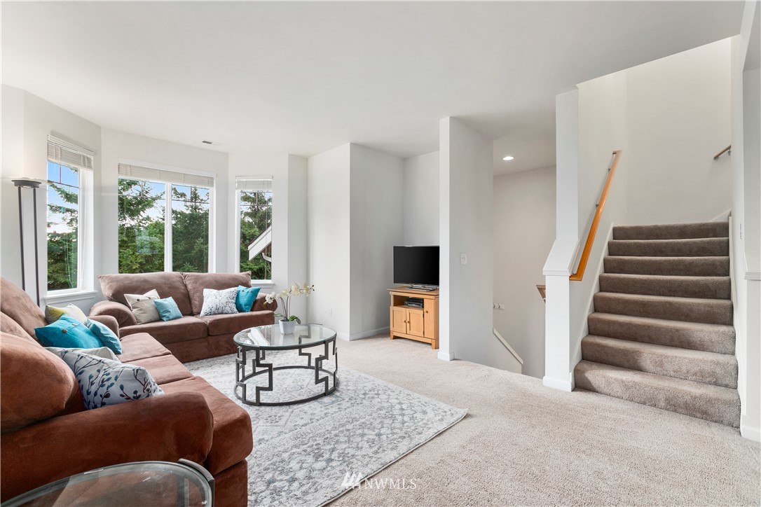 4024 Northeast 4th Place Renton, WA 98056 - Photo 7 of 29 a living room with furniture and a large window