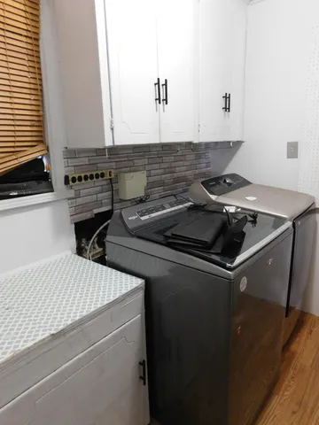 a close view of kitchen sink and stove