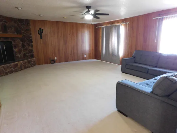 a living room with furniture and window