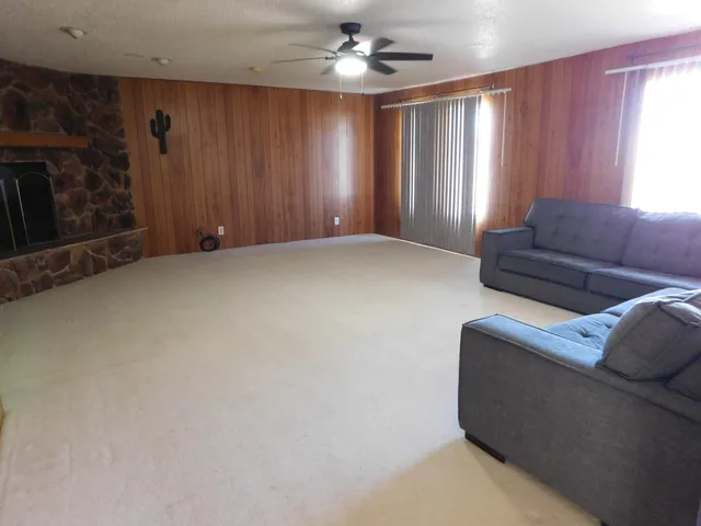 a living room with furniture and window