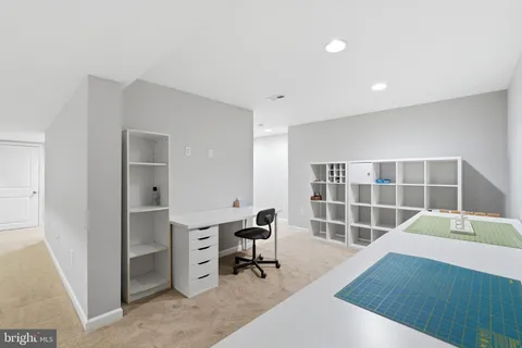 a backyard of apartments with large trees