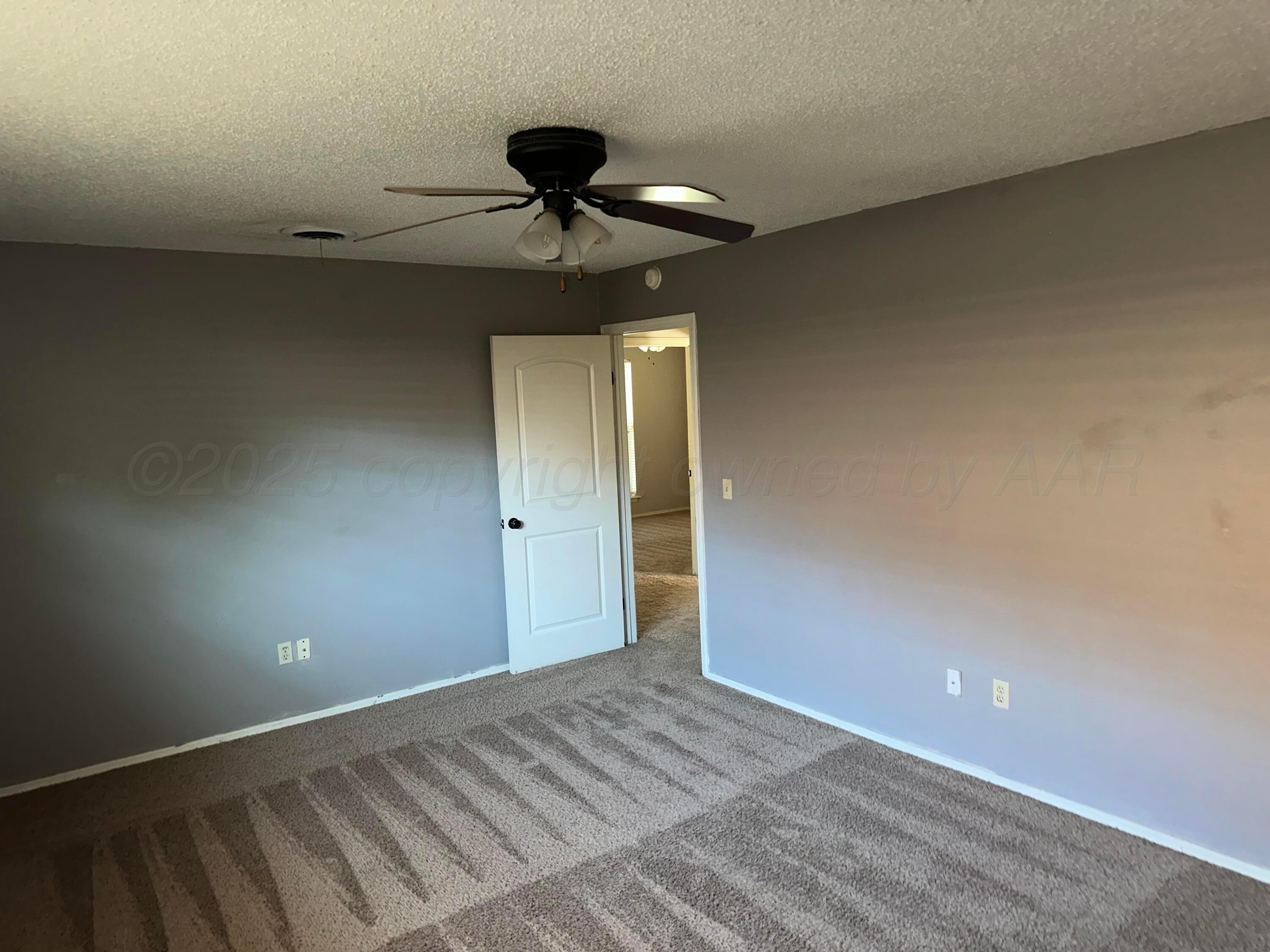 1003 Cimarron Trail Canyon, TX 79015 - Photo 8 of 16 a view of an empty room and window