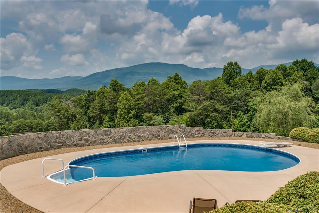 506 Jones Road Mill Spring, NC 28756 - Photo 22 of 32 a view of a swimming pool with an outdoor space