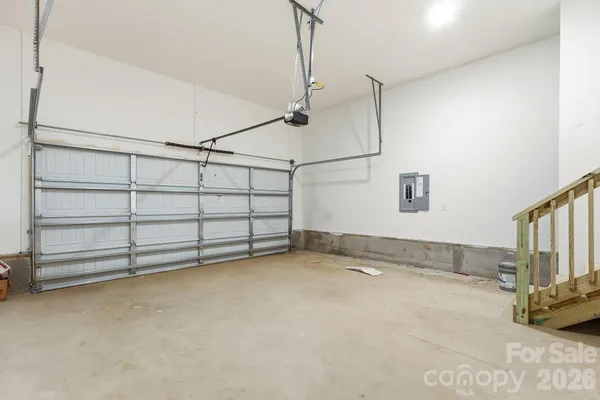 a view of a garage with wooden walls