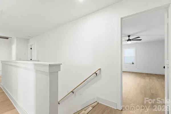 a view of a hallway with closet