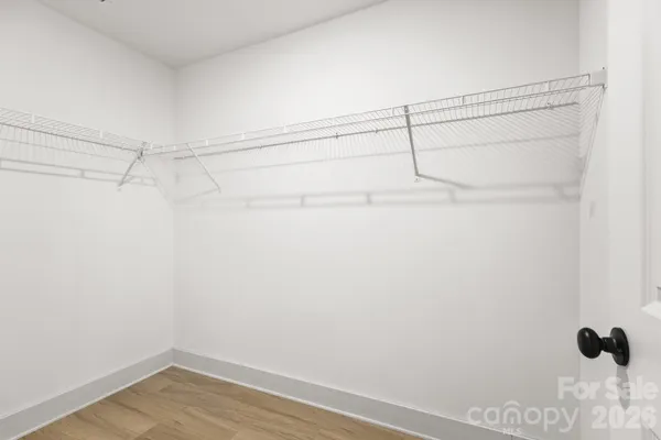 a view of a room with racks on the wall