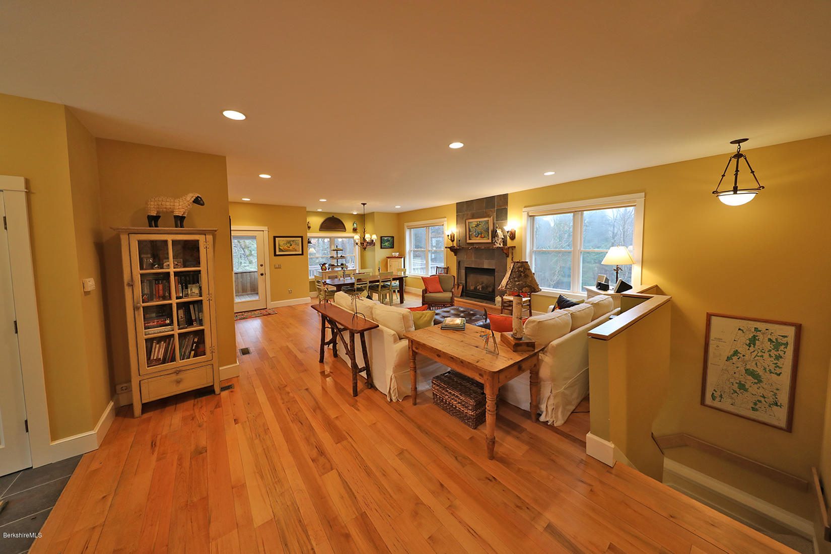 515 Ed Jones Road Otis, MA 01253 - Photo 2 of 21 a living room with furniture a wooden floor and next to a window