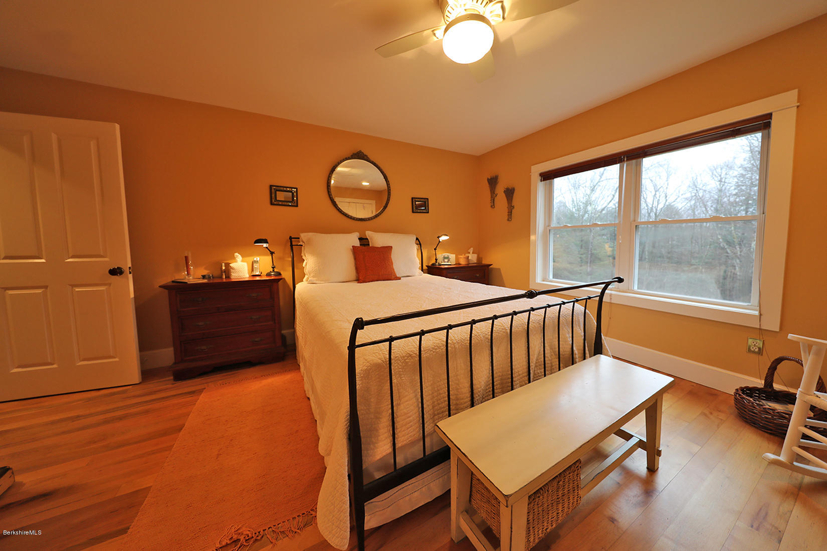 515 Ed Jones Road Otis, MA 01253 - Photo 12 of 21 a bedroom with furniture and a window