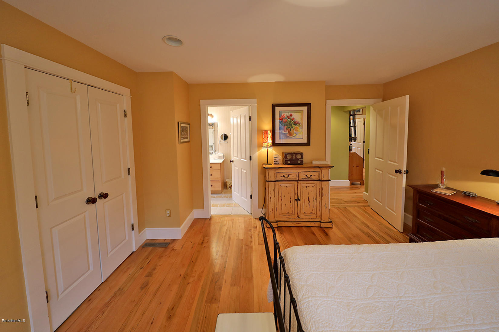 515 Ed Jones Road Otis, MA 01253 - Photo 13 of 21 a view of a living room hardwood floor and a kitchen