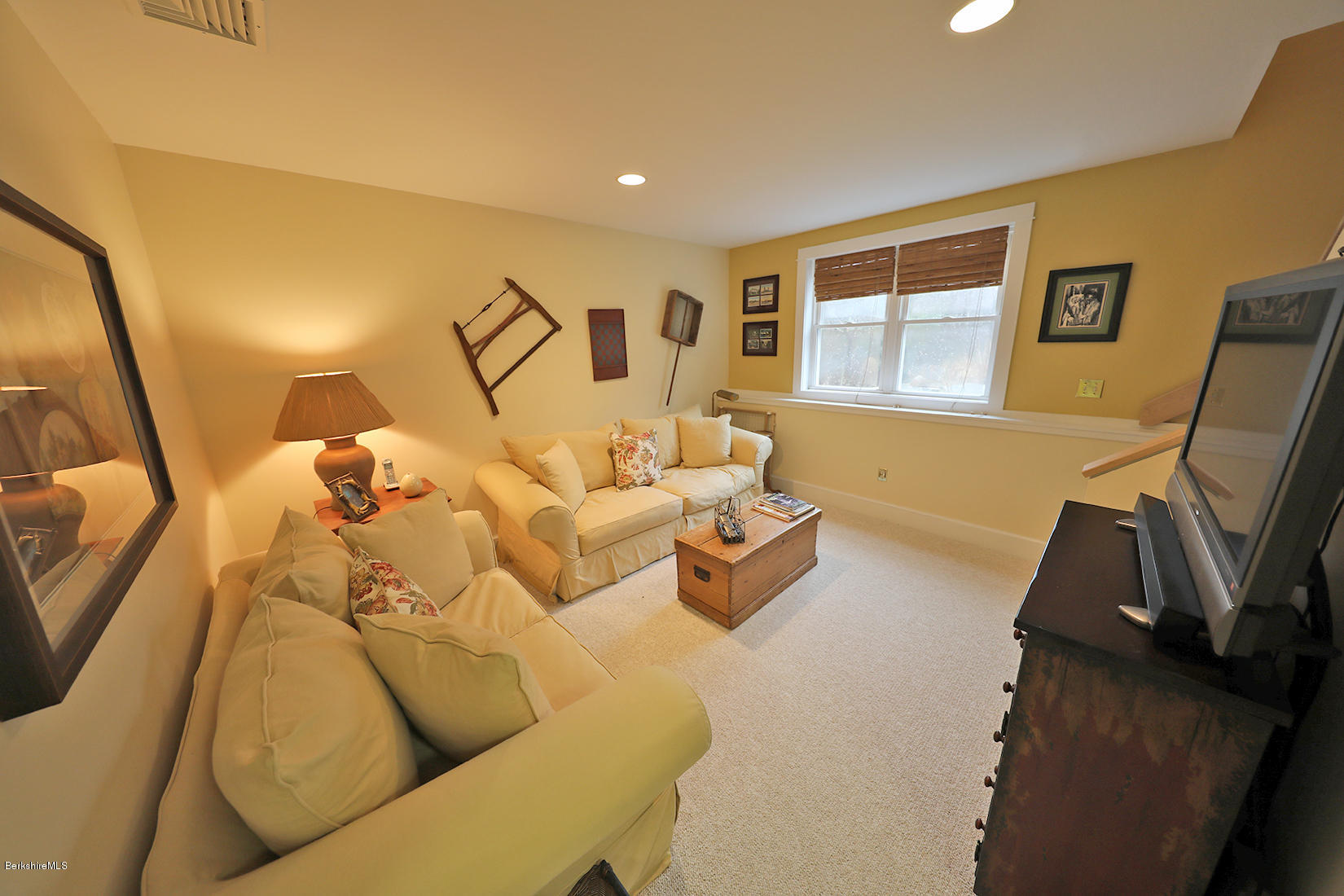 515 Ed Jones Road Otis, MA 01253 - Photo 15 of 21 a living room with furniture and a flat screen tv