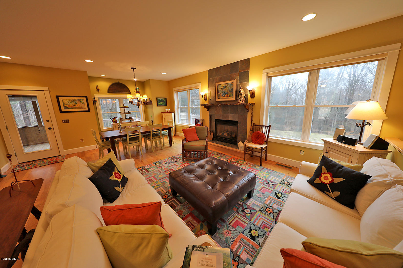 515 Ed Jones Road Otis, MA 01253 - Photo 5 of 21 a living room with furniture and a fireplace