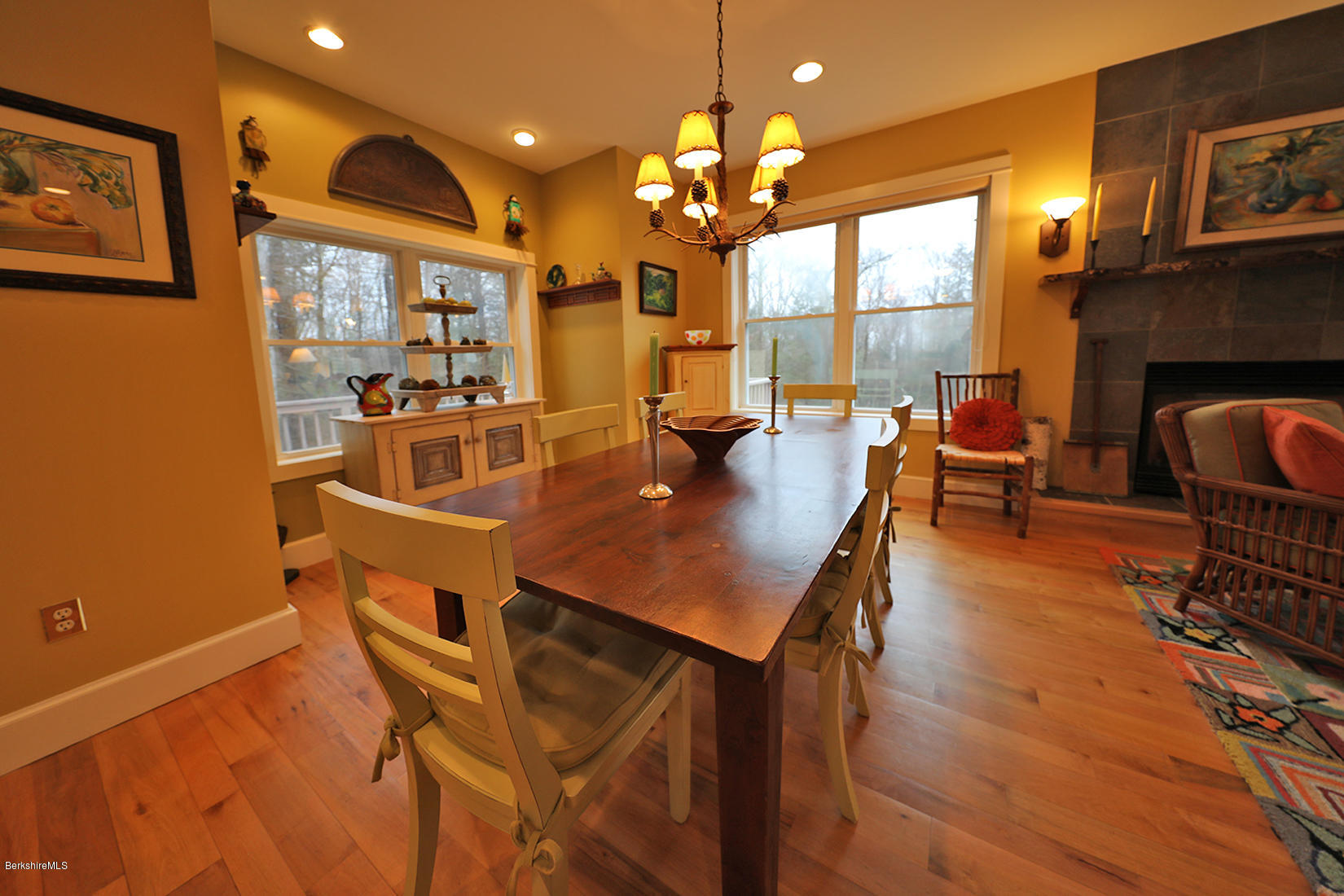 515 Ed Jones Road Otis, MA 01253 - Photo 6 of 21 a view of a dining room with furniture window and wooden floor
