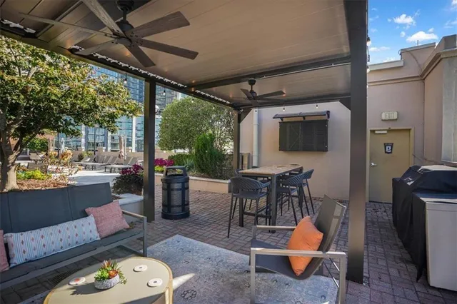 a view of an outdoor space with furniture