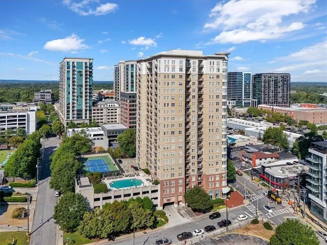 a view of a city with tall buildings