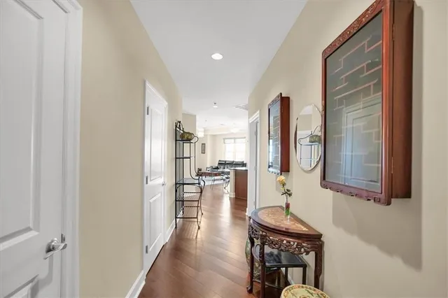 a kitchen with stainless steel appliances granite countertop a sink a stove and a microwave